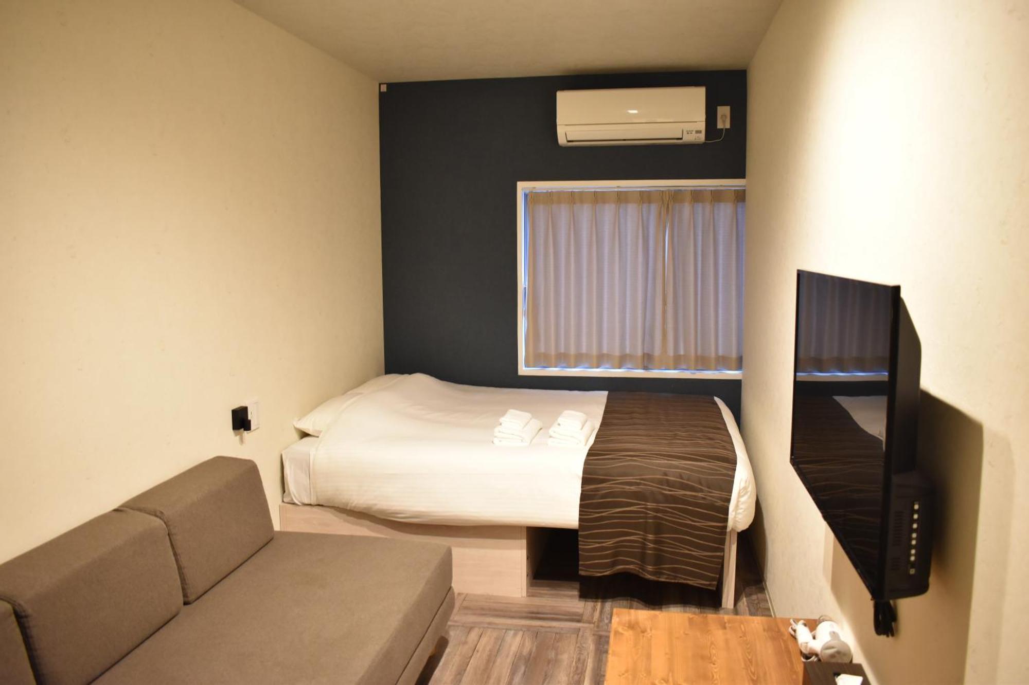 Shinsaibashi House Hotel Osaka Kamer foto