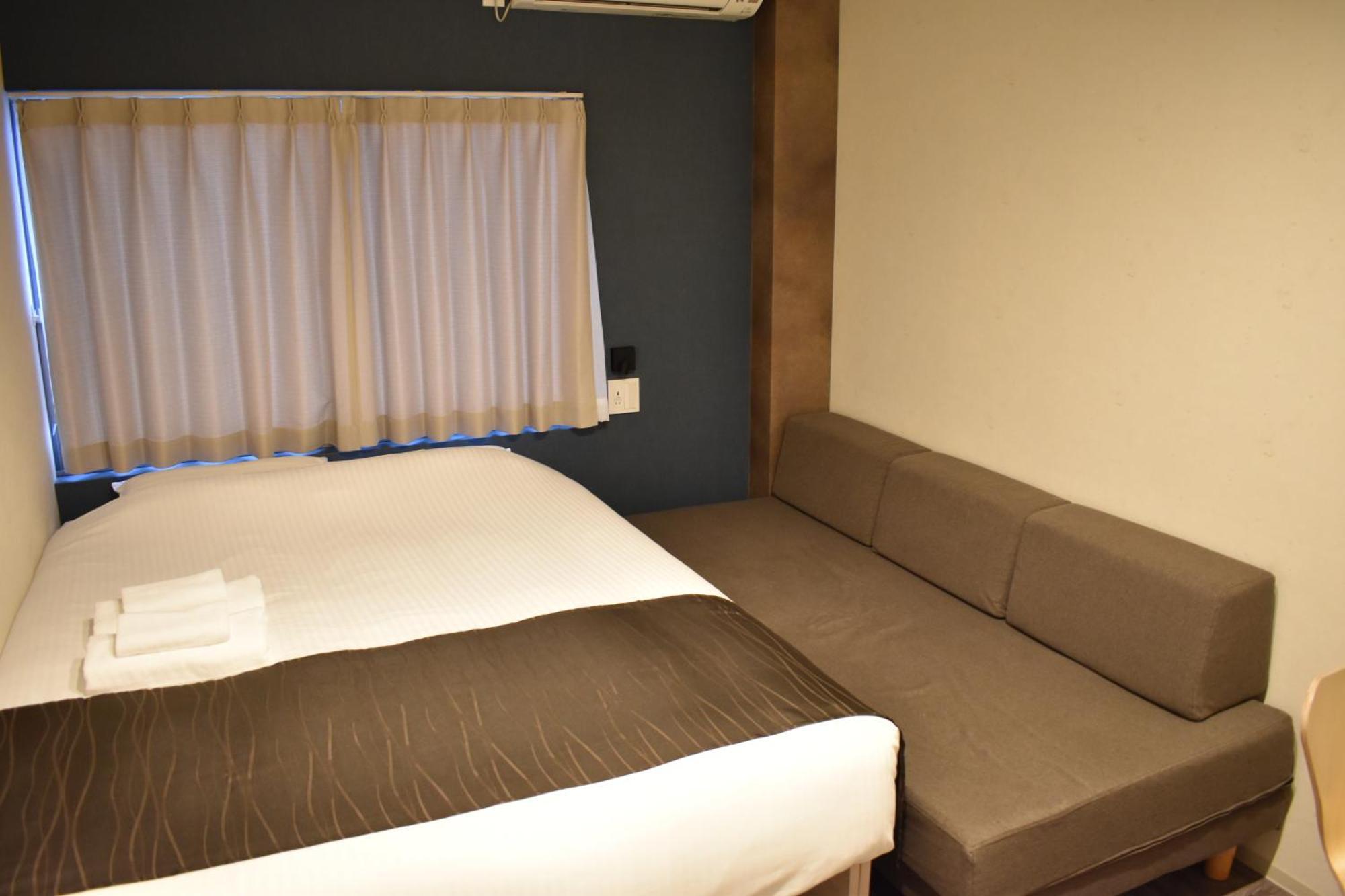 Shinsaibashi House Hotel Osaka Kamer foto