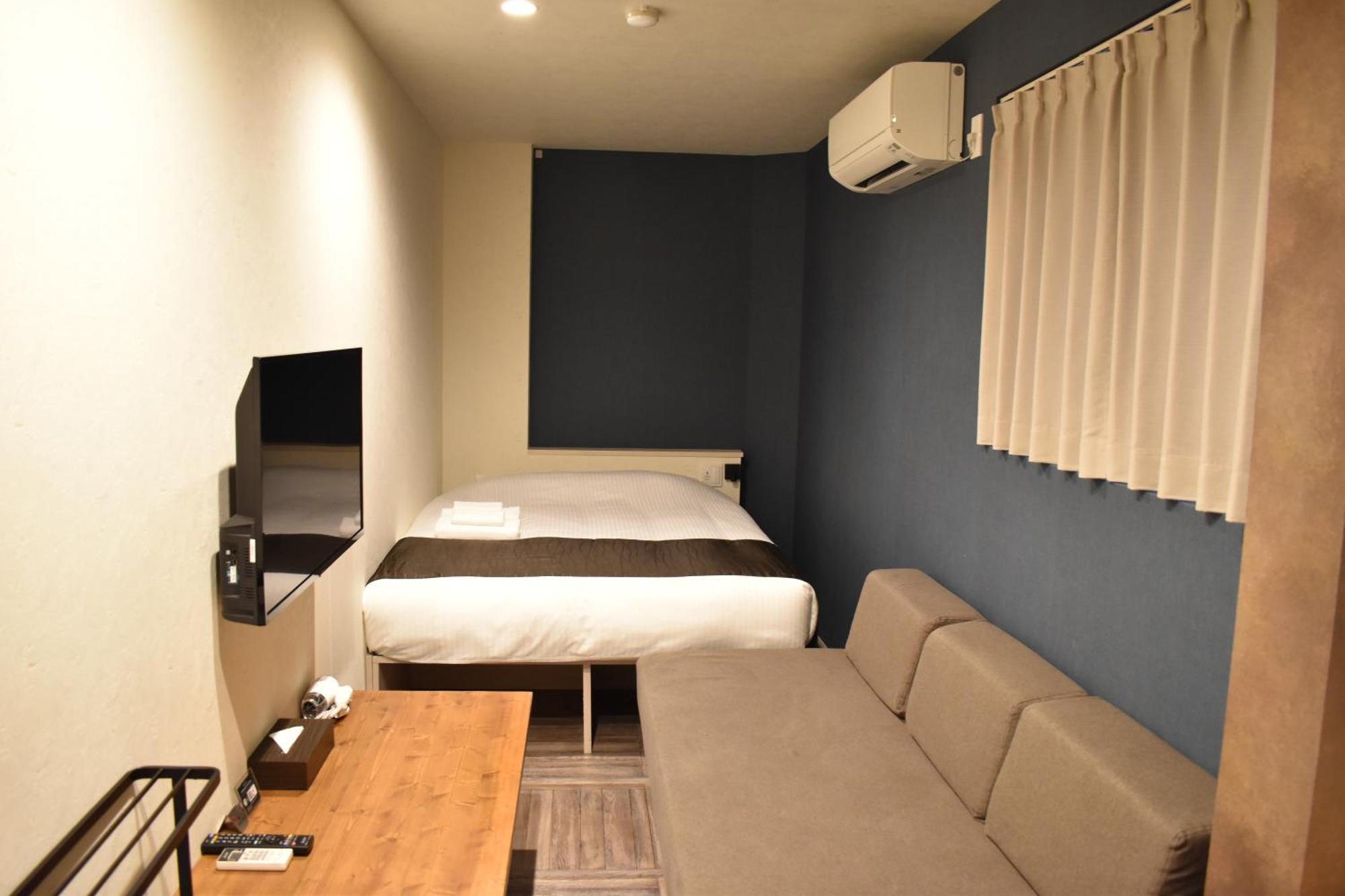 Shinsaibashi House Hotel Osaka Kamer foto
